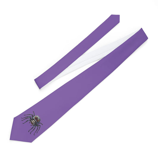 a purple tie with a spider design on it.