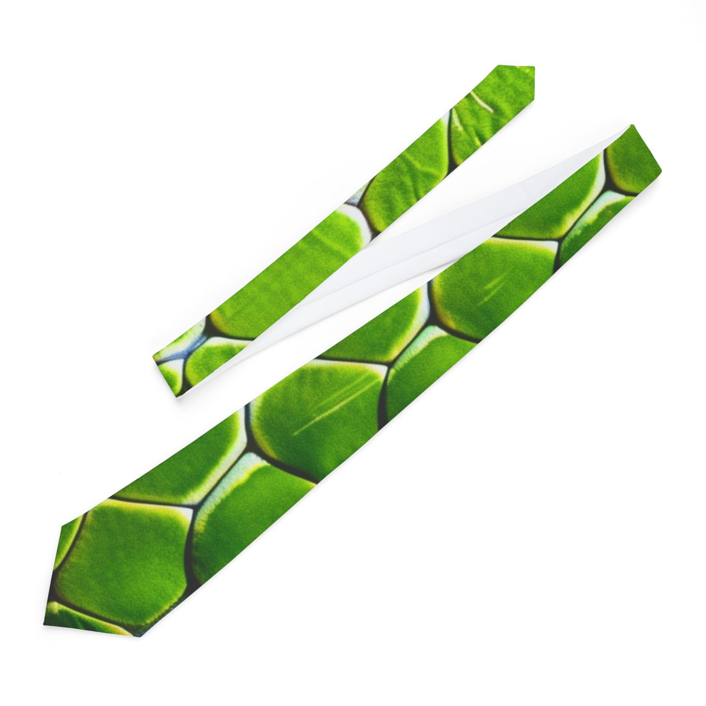 a tie with a green leaf pattern.