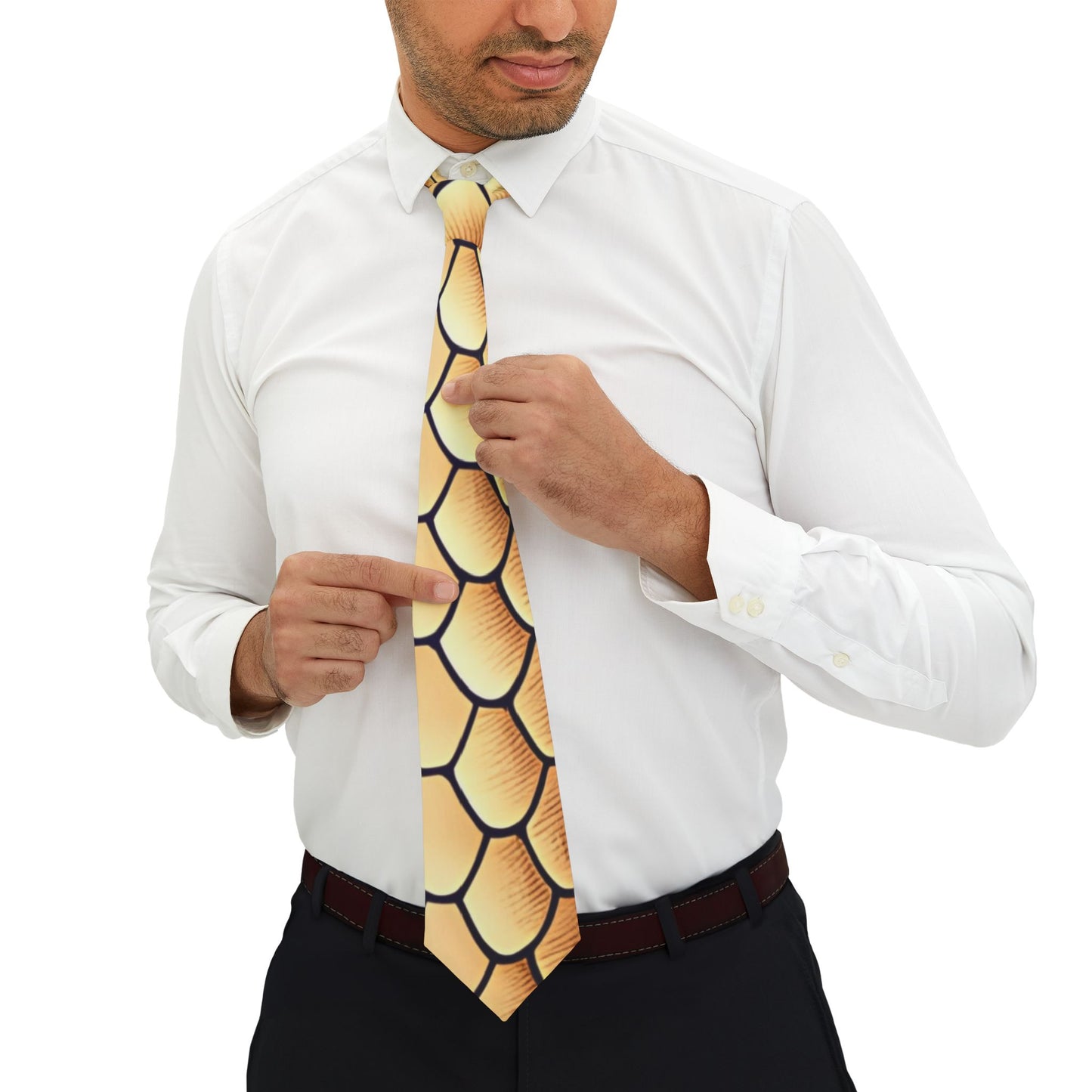 A man in a white shirt and black pants is adjusting his tie, which has a unique yellow and black pattern.