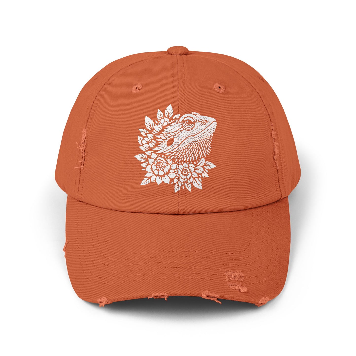 An orange baseball cap with a white design featuring a bearded dragon or lizard.