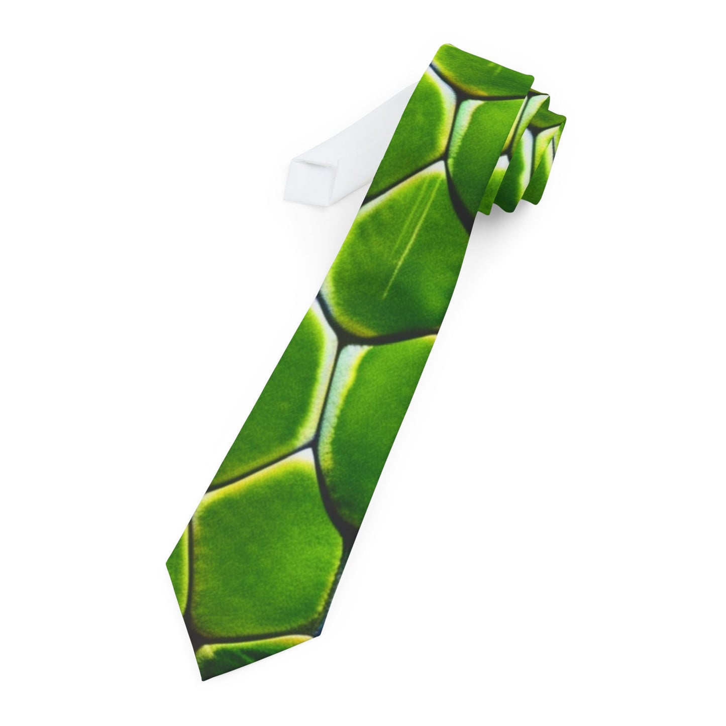 A green tie with a pattern of overlapping hexagons is shown against a white background.