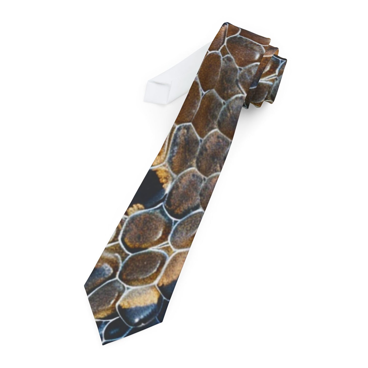 A tie with a unique pattern of brown and black hexagonal shapes, resembling a honeycomb design.