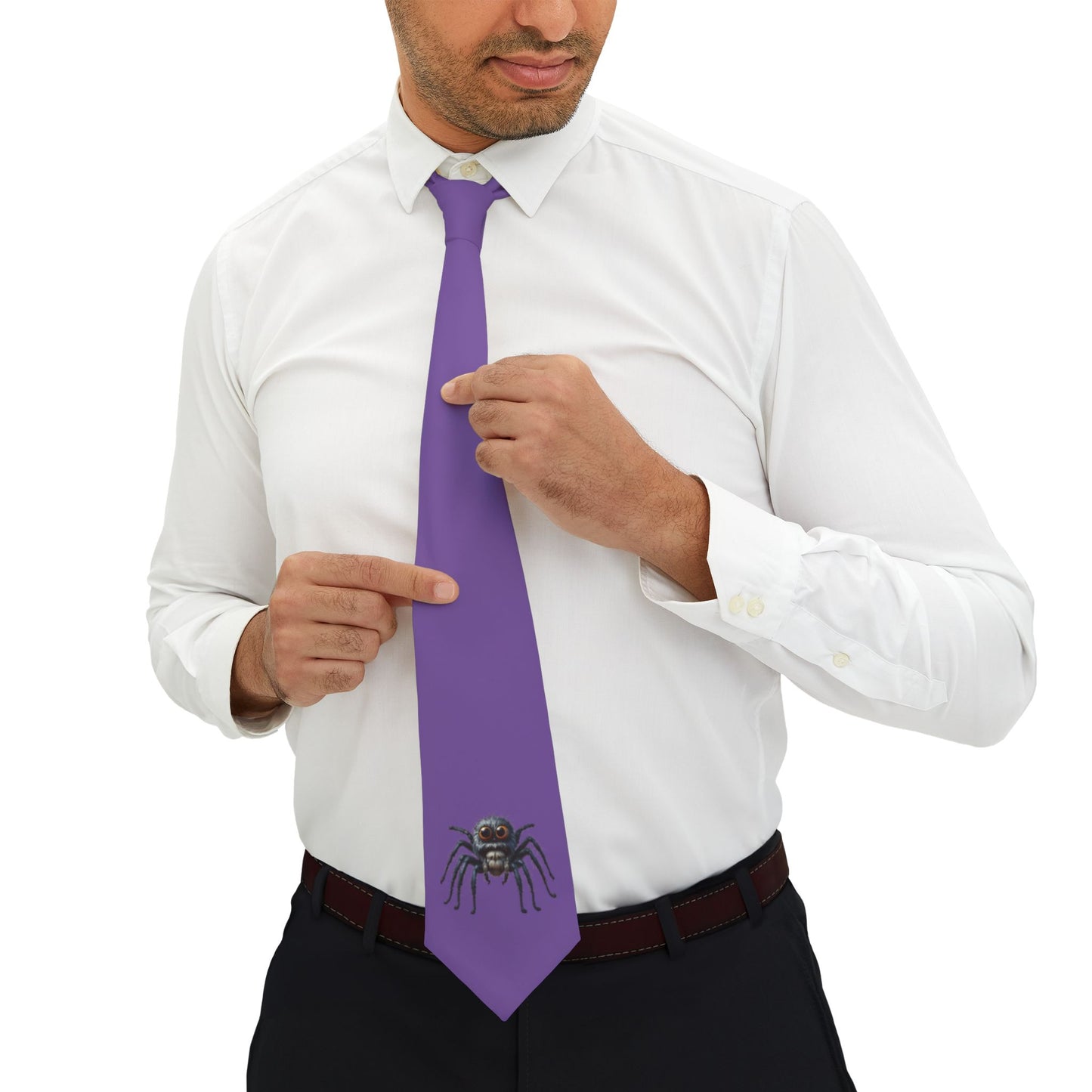 A man in a white shirt and black pants is adjusting his purple tie, which has a spider design on it.