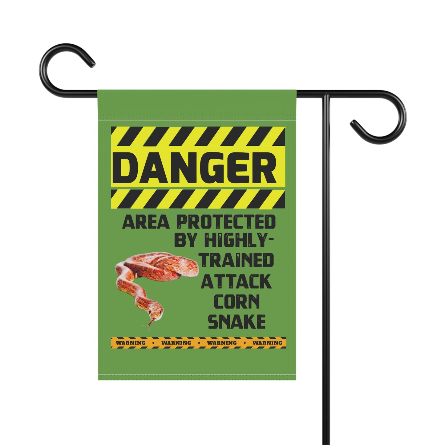 a warning sign that reads "DANGER AREA PROTECTED BY HIGHLY- TRAINED ATTACK CORN Snake".